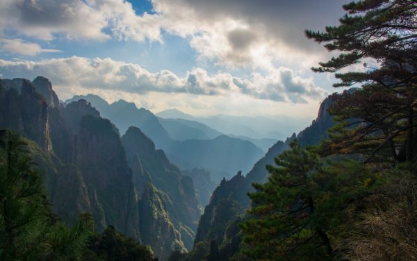 Mountain ridges receding into mist at Huangshan in China